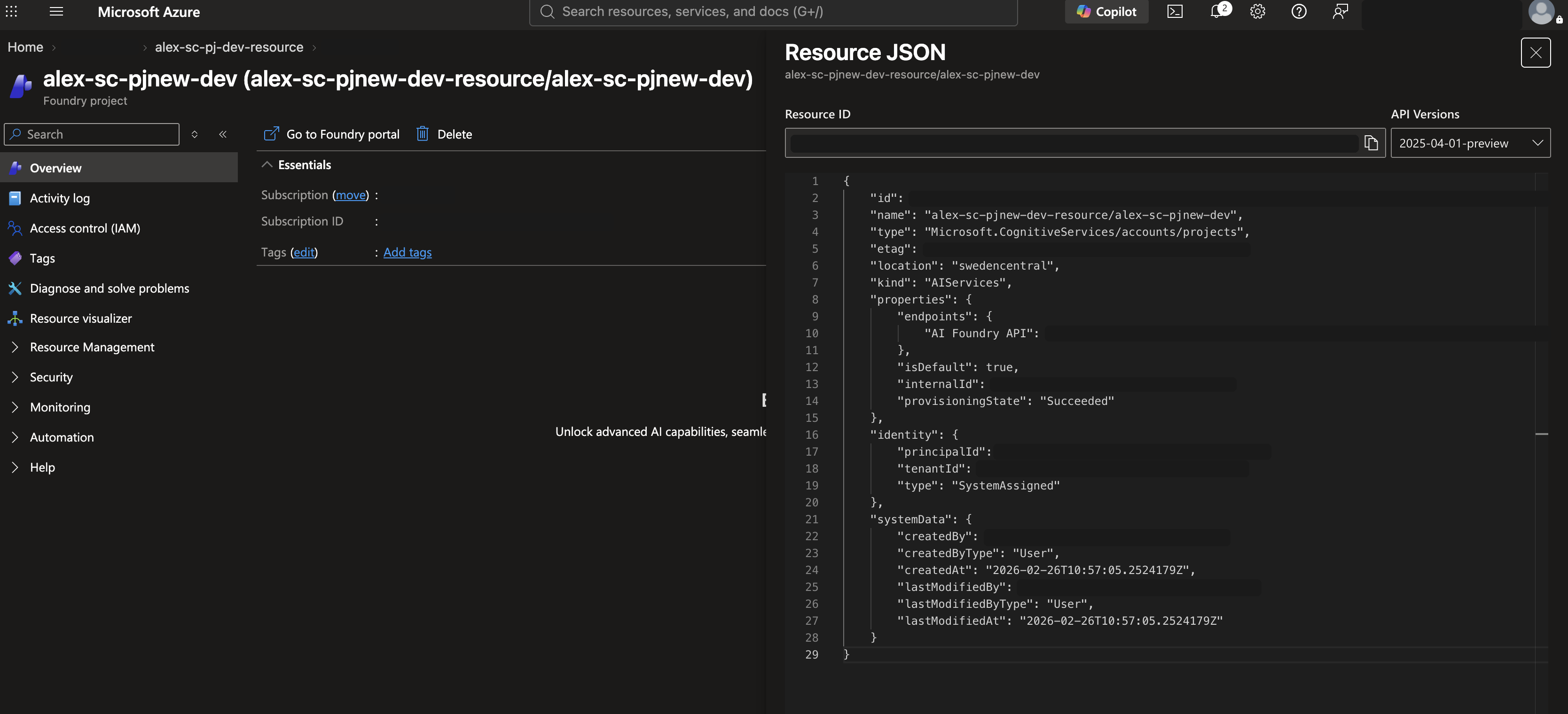 Azure portal JSON view of a Foundry project showing its system assigned managed identity with identifiers covered